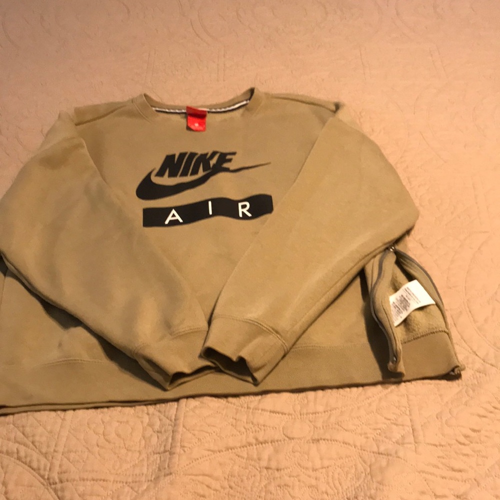 Nike Air sweatshirt. Gently used . One slight stain not very noticeable.